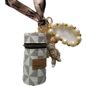 LipsGal Cosmetics LLC Sparklin' Goldie Bear Chunky Bear Keychain with Pearl Beads and Gold Accents for Stylish Accessories