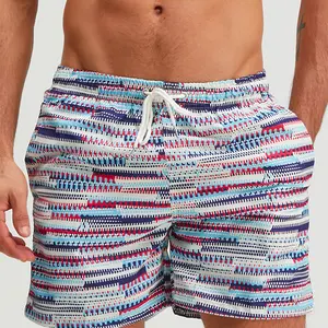Men’s retro ethnic striped beach shorts—casual, trendy vacation style. Lightweight, quick-drying, loose fit with an elastic waistband. Versatile for everyday wear and outings; comfortable, laid-back shorts.