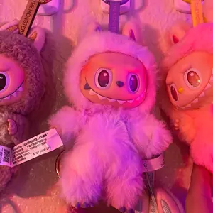 Labubu Luck - Adorable Pink Plushie with Large Eyes and Soft Texture