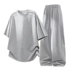 Summer solid-color crewneck pullover short-sleeve T-shirt paired with drawstring elastic-waist pants with pockets—a casual set; men’s stylish athletic two-piece set, comfortable and breathable for everyday wear and vacations. Summer vibes