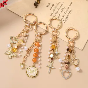 2026 New Arrival: Best-Selling Beaded Keychain & Bag Charm - Featuring Round Disc, Cross, Butterfly, and Heart Pendants
