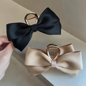 Elegant Hair Bow - Black and Beige Bow with Unique Design and Secure Clasp