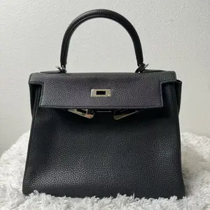 Pre-owned HERMÈS Togo Tote Bags Kelly Retourne in Black leather with Palladium hardware