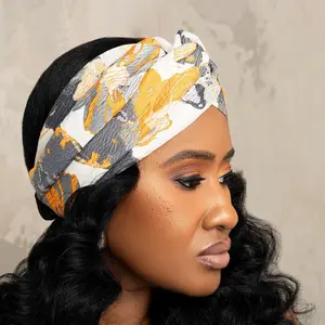 Monarch Turban Headband - Orange, Cream and Grey Halo Reversible Handmade Headband This handmade, reversible design provides a comfortable fit with a circumference of 21 inches, stretching up to 24 inches for added versatility.