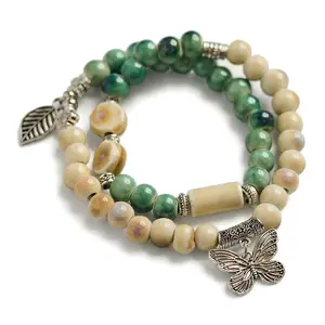 Handmade Green Beige Buddha Mala Bracelet | Lucky Butterfly Charm Spiritual Gift For Her
