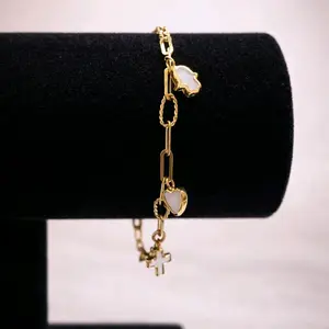 Brazalete con colgantes de oro de 14kt medida 7.5 de 3.20mm