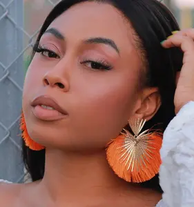 STATEMENT GOLD | Orange Tassle Earrings