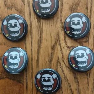 In Real Time Fnaf Freddy 1 pc Button-Pins - 1 pc, Round Design, Black and Red Color, Cartoon Character Design