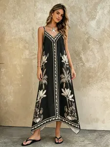 A women's black floral print Boho irregular design V-neck Strappy halter loose woven summer dress with a beachy vibe