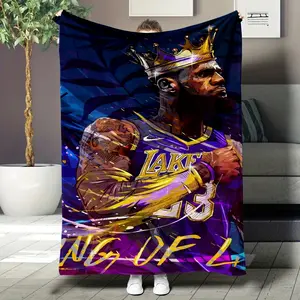 Batman standing against a city street backdrop - a must-have blanket for lunch breaks and home decor; the perfect Valentine's Day gift.