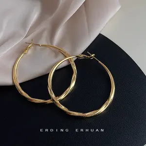 Golden Hoop Earrings For Women The Twisted Close-Fitting Hoop Shape Is Crafted With Gold-Plated Material And S925 Silver Pins Light Luxury Elegant Unique And Minimalist Style