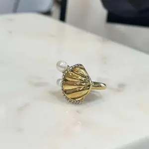 Gold Pearl Ring with Shell Design and Rhinestones