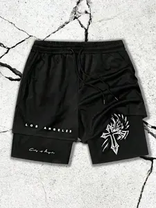 Men’s sports fitness shorts featuring a Los Angeles “City of Angels” cross-stitch print on a faux two-piece athletic short. Street Gothic attire, drawstring waistband, comfortable black shorts – essential for summer fitness and running.