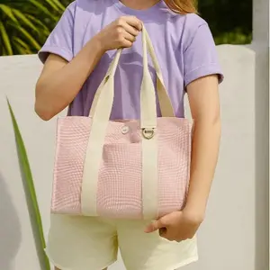 Margo 38 Two-Tone Cotton Canvas Tote Bag with Adjustable Strap Spacious Stylish Design Snap Closure Quick-Access Front Pocket D-Ring Detail Secure Closure
