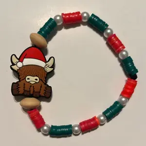 Highland Cow Christmas Beaded Bracelet with Festive Red Green & White Beads Featuring a Cute Cow Charm