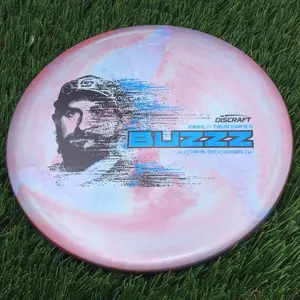 Discraft Special Blend Titanium Metallic Big Z Pearl Buzzz with 2026 Chris Dickerson Tour Series Stamp - 176.4g - Blue And Red Swirls Varies