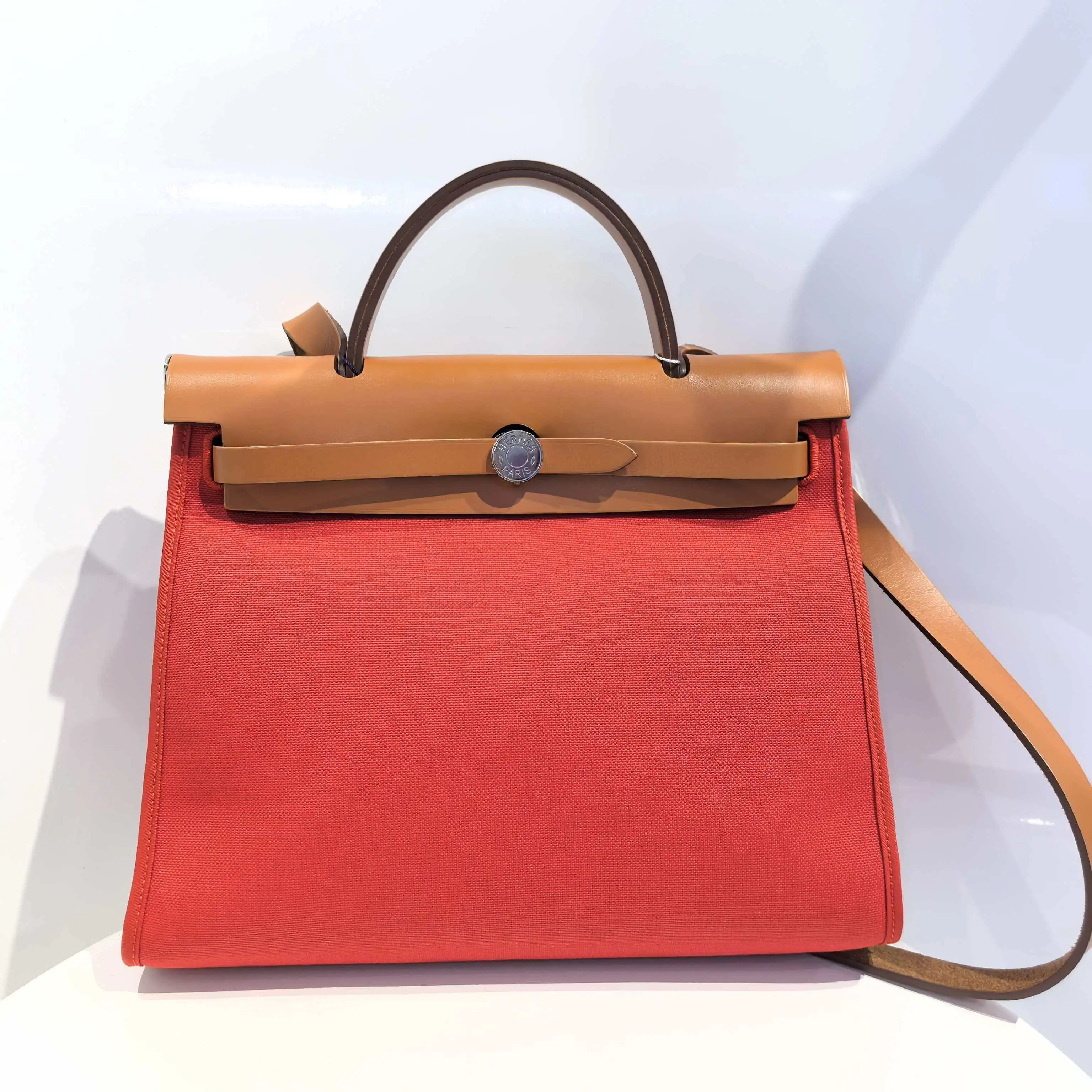 Pre-owned HERMÈS Hermes Herbag 31 Orange Canvas Trimmed Handbag with Brown Leather Accents and Classic Design