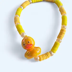 Yellow and Pastel Yellow Rubber Duck Charm Bracelet with Colorful Beads and Adorable Duck Design