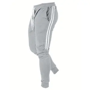 Men's Casual Pants: Soft fabric sporty style with vertical stripe details — a versatile wardrobe essential offering all-day comfort and a refined touch Grey Sweatpants Outfit Streetwear Joggers