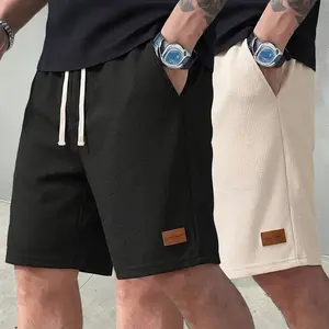 Men’s waffle-textured casual athletic shorts, 2-pack, featuring a drawstring waist design and lightweight polyester fabric; suitable for everyday summer wear, running/exercise with breathable performance, beach activities, and outdoor events. run sport
