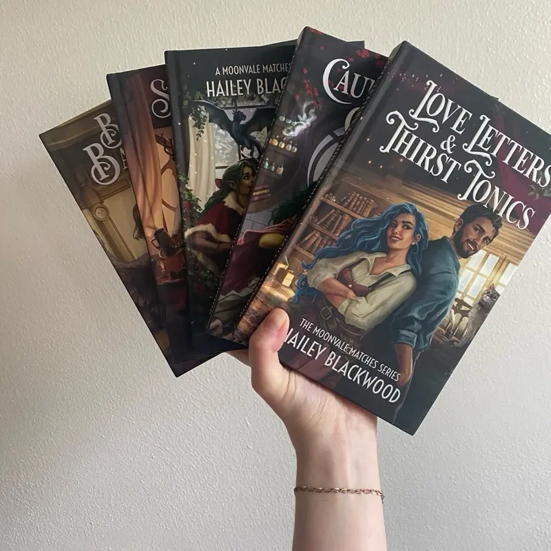 Moonvale Matches Signed Hardcover Book Bundle (Love Letters and Thirst Tonics, Cauldrons and Cat Tails, Merry in Moonvale, Shadows and Ciders, Brews and Bandages) lover bookish bundle romance books