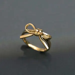 1 Elegant Boho Style Women'S Bow Ring - 18K Golden Plated Zinc Alloy, Simple Ribbon Knot Design, Perfect for Daily Wear, Engagement, Wedding, and Anniversary Gifts, Versatile Jewelry |   Elegant Ring Design |   Durable Ring