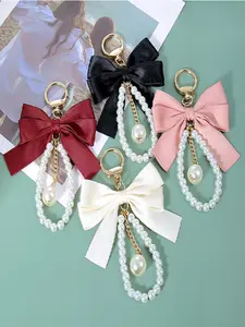 Women's Elegant Bow Keychain Wristlet Strap, Faux Pearl Chain Car Key Holder, Unique Handbag Charm Accessory for All Seasons