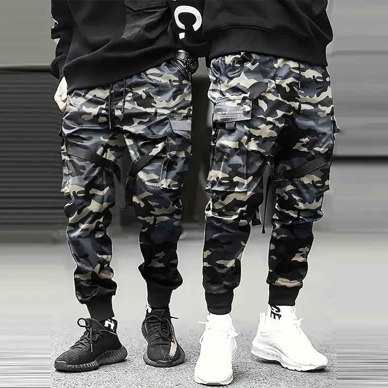 Men’s cargo jogger pants, 1-pack, for spring and autumn, featuring an all-over camouflage print design, drawstring waist, functional straps, and multiple zippered pockets for decorative accents; suitable for holiday outdoor outings, street-style looks, an