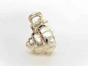 Small gold metal and pearl seashell hair claw clip bridal clip
