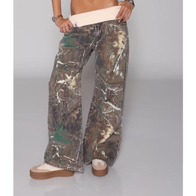 Retro street style, figure-flattering, high-waisted, washed blue denim jeans for women.