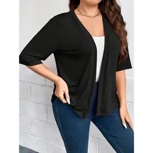 This oversized Women's cardigan features a classic mandarin collar mid length sleeves and a solid color design Made of high quality fabric it ensures breathability and a -light touch