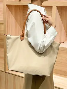 Commuting bag made of nylon fabric with genuine leather, new large-capacity tote bag, lightweight and simple shoulder bag