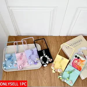 Candy-colored phone case with protective hinge protection, comes with a checkered hand chain. The hard PC back plate protects the phone. Compatible with Motorola Razr 2026, Razr 2025, Razr 2026, Razr 70, Razr 60, Razr 50 Ultra