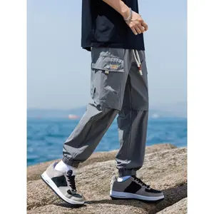 Men's Waterproof & Windproof Cargo Pants - Breathable, Quick-Dry for Hiking & Camping, Nylon, Solid Color with Drawstring Detail Menswear Trouser