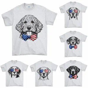 Puppy Love Dog T-shirt Showcasing 50 dog breeds in 4th of July Graphic Ash Grey Color, Cute Puppy Independence Day Shirt for Dog Lovers, printed on a cozy Gildan unisex crew pullover for pet lovers.