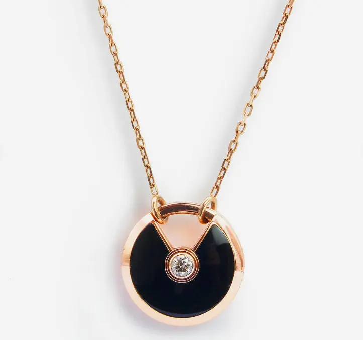 Pre-owned Cartier Amulette De Cartier chrysoprase/white MOP/black onyx Pendant Necklace