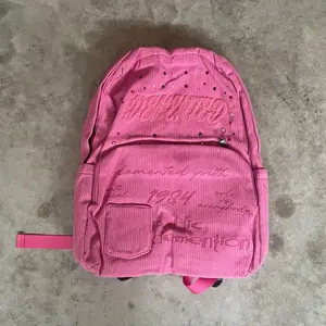 Demented Youth Rhinestone Bag - Corduroy Backpack with Embroidered Logo and Rhinestone Accents