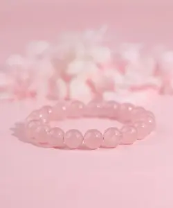 Rose Quartz Bracelet. Known as the 'Love Stone', it heals the heart, enhances interpersonal relationships, and promotes career development. Consecrated by a Taoist master