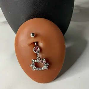 Pink kitty belly ring