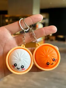 Cute Expression Bun Keychain, fun cartoon design, colorful and lovely soft silicone stress-relief toy, playful food-shaped ornament, perfect for party decoration and gift-giving