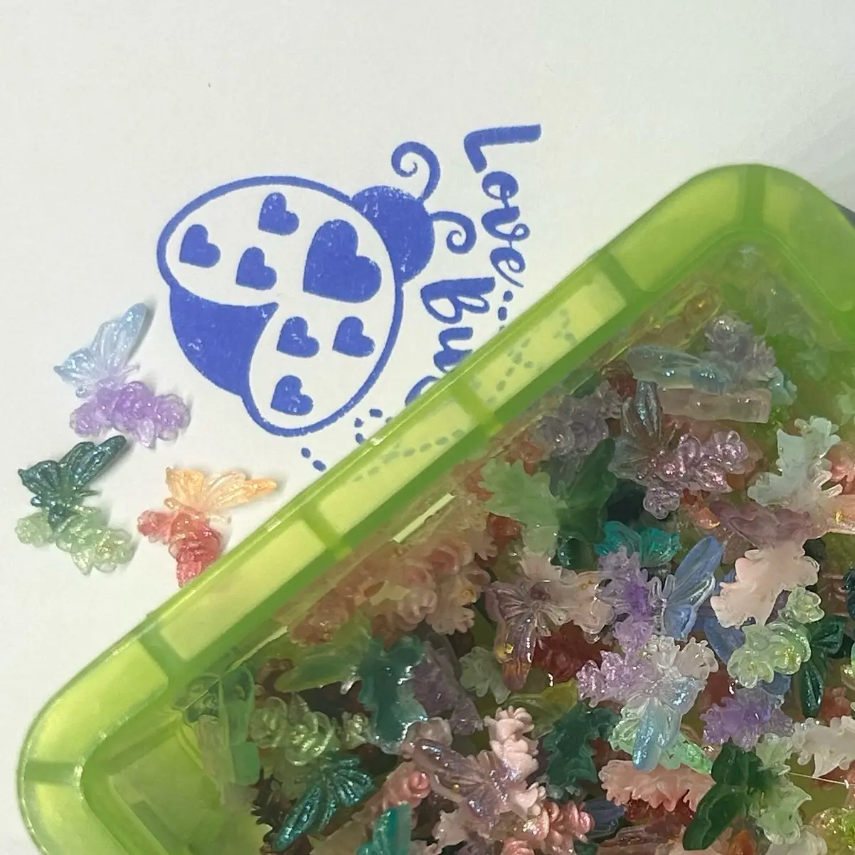 Nail charms in various sizes and colors for crafting.  Pen Decorating, fingernail decoration, and any other small crafting project.
