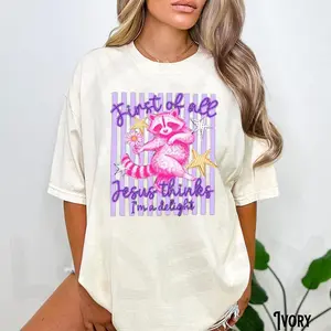 Women's 100% Cotton Short-Sleeve T-Shirt - First of All Jesus Thinks I'm A Delight Shirt, Funny Christian Raccoon Graphic Tee, Faith Humor T-Shirt, Cute Church Gift