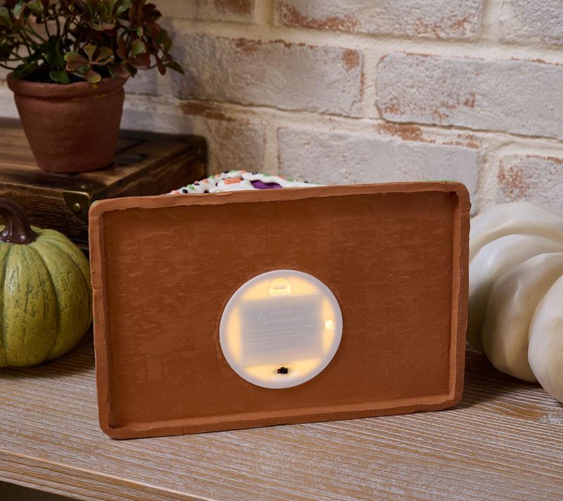 Illuminated Halloween House with Ghosts and Pumpkins by Valerie