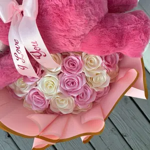 bouquet of roses with plush