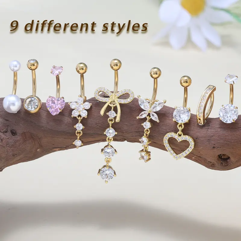 Women's 8-Pcs Gold Hypoallergenic Stainless Steel Rhinestone Belly Rings - Female Body Jewellery with Cubic Zirconia Heart, Butterfly, Bow, Flower Dangles, Faux Piercing for Beach Wear