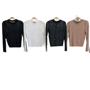 Stella Top -Long fitted top in mesh. Round neckline with trim. 95% Polyester 5% Spandex    Womenswear Blouse Long Sleeve