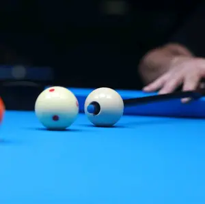 The Holey Ball! Billiard stroke trainer.