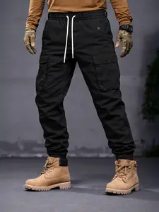 Mens cargo jogger pants drawstring waist tapered fit with elastic ankle cuffs flap utility pockets matte woven workwear streetwear bottoms for festival travel Stagecoach weekend draft weekend road trips and daily casual wear