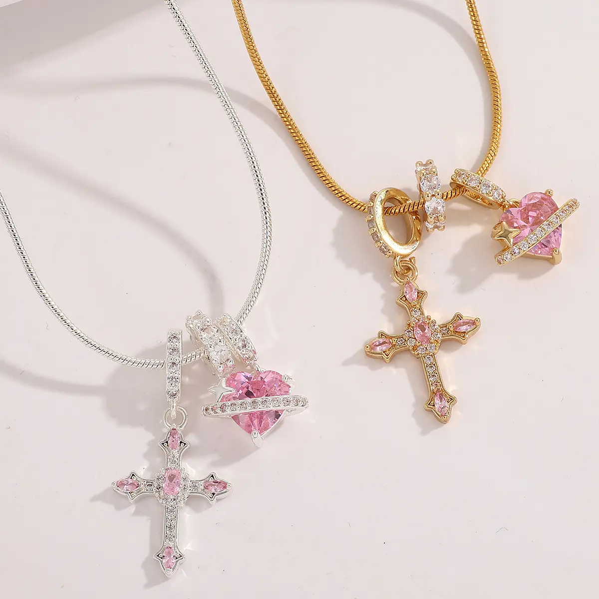 pink cross charm necklace, heart planet pendant necklace, Y2K aesthetic jewelry, snake chain necklace, viral TikTok jewelry, trendy women necklace 2026, dainty pink crystal necklace, grunge cross jewelry, gold silver layered necklace locket
