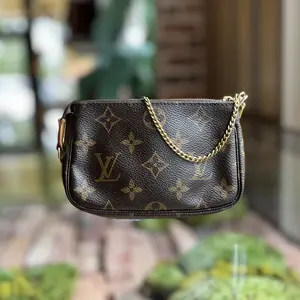 Pre-owned Louis Vuitton Coated canvas Mini Bags Mini Pochette Accessories Brown Monogram Canvas Handbag